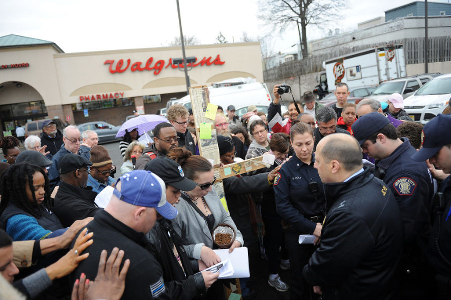 Various congregations, comprising Episcopalians, Lutherans, Methodists, Protestants and Roman Catholics perform the Stations of the Cross by visiting 14 sites of violent incidents in Jersey City over the last year on Good Friday, April 3, 2015. Reena Rose Sibayan | The Jersey Journal