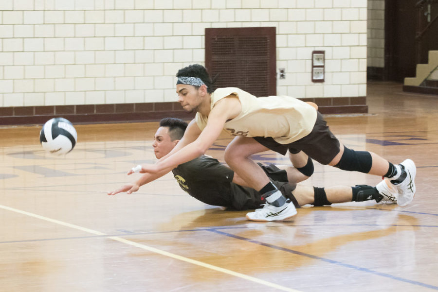 Bayonne defeats McNair, 25-18, 25-14, in the NJSIAA North 2 quarterfinals in Bayonne on Thursday, May 21, 2015. Pictured are Terrence Cando (left) and Orlando Robledo of McNair. Reena Rose Sibayan | The Jersey Journal