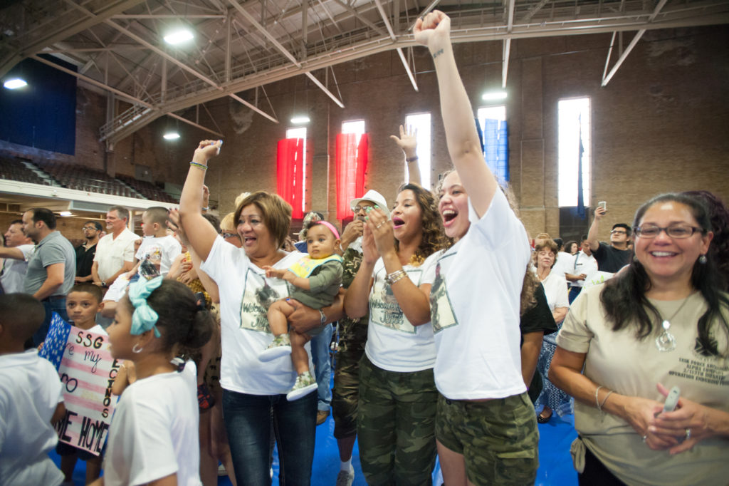 Families and dignitaries welcome home 160 soldiers of the New Jersey Army National Guard's Alpha Company, 2-113th Infantry Battalion, after a nine-month deployment in the Persian Gulf, with a ceremony held at the Jersey City armory on Thursday, June 25, 2015. Reena Rose Sibayan | The Jersey Journal