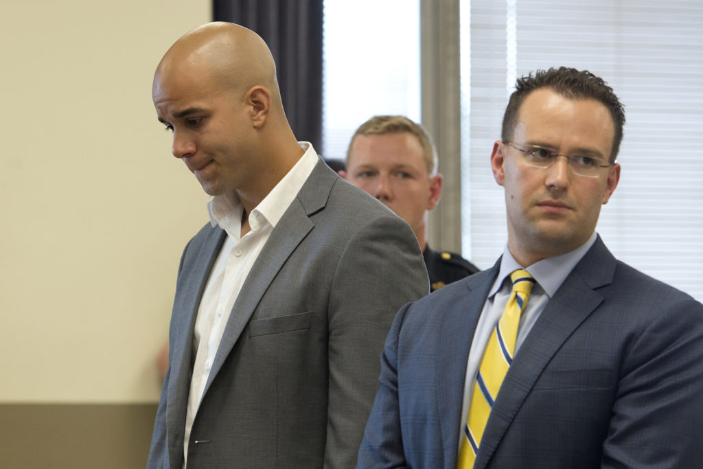 Luis E. Garcia, 24, of the Bronx, listens to statements of Ron Hill II's family during his sentencing on Friday, June 26, 2015. At right is his lawyer, Joel Silberman. Reena Rose Sibayan | The Jersey Journal