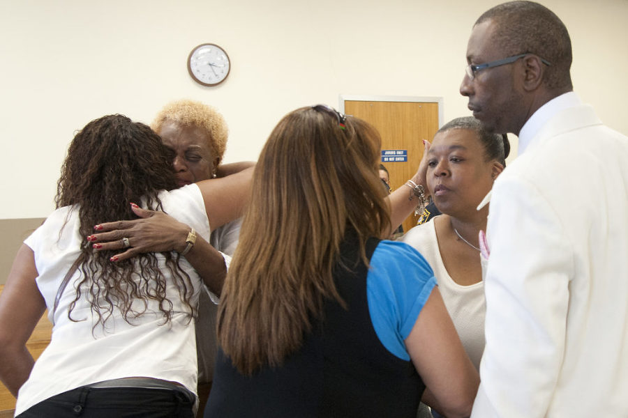 After the sentencing, grieving family members and friends of the vehicular homicide victim, Ron Hill II, and convicted killer, Luis E. Garcia, crossed the courtroom aisle and hugged and cried in each other