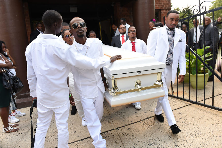 Dawn and Ronald Witherspoon Sr. close the lid on the casket of their son, Ronald Witherspoon Jr. at the conclusion of his funeral at Mt. Olive Baptist Church in Jersey City on Tuesday, Aug. 4, 2015. The Lincoln High School student was shot in the head in the early morning hours of July 22 on Belmont Avenue. Reena Rose Sibayan | The Jersey Journal