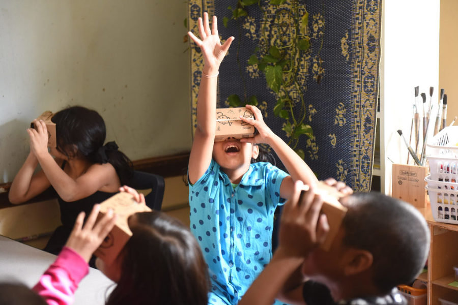 Third-grade students at the Learning Community Charter School in Jersey City experienced first hand the Google Expeditions program, an app that works on a smart phone and tablet using Google map technology and panoramic photography of different places around the world. A cardboard box over the smart phone uses 3D lenses to create a 360-degree virtual reality experience. Using the tablet, teachers can point their students to particular features of an expedition. Reena Rose Sibayan | The Jersey Journal