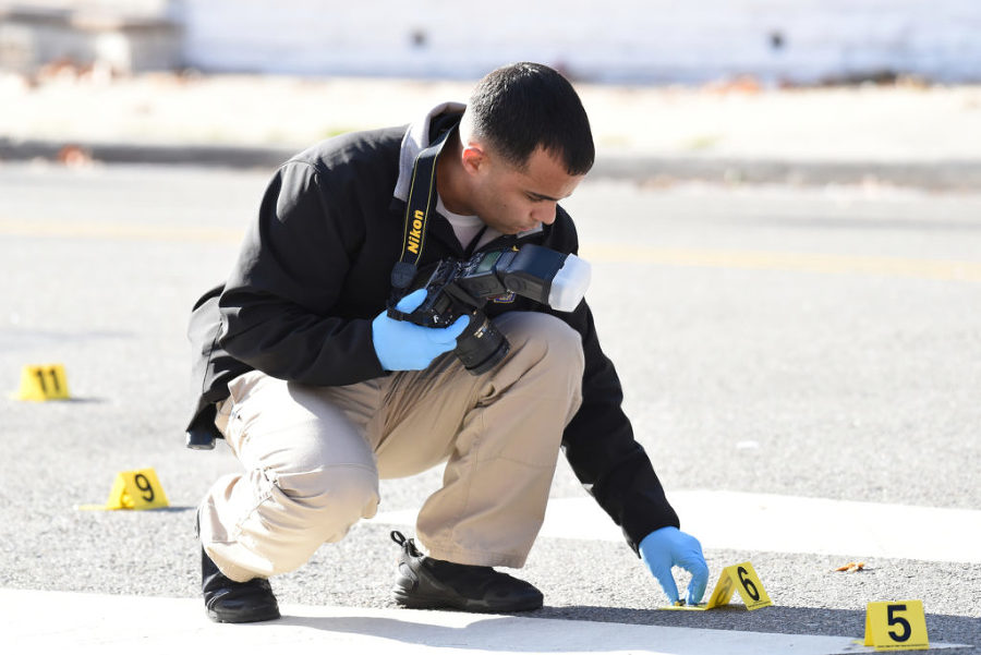 Police investigate a shooting on Old Bergen Road near Neptune Avenue in Jersey City on Monday, Nov. 23, 2015. Reena Rose Sibayan | The Jersey Journal