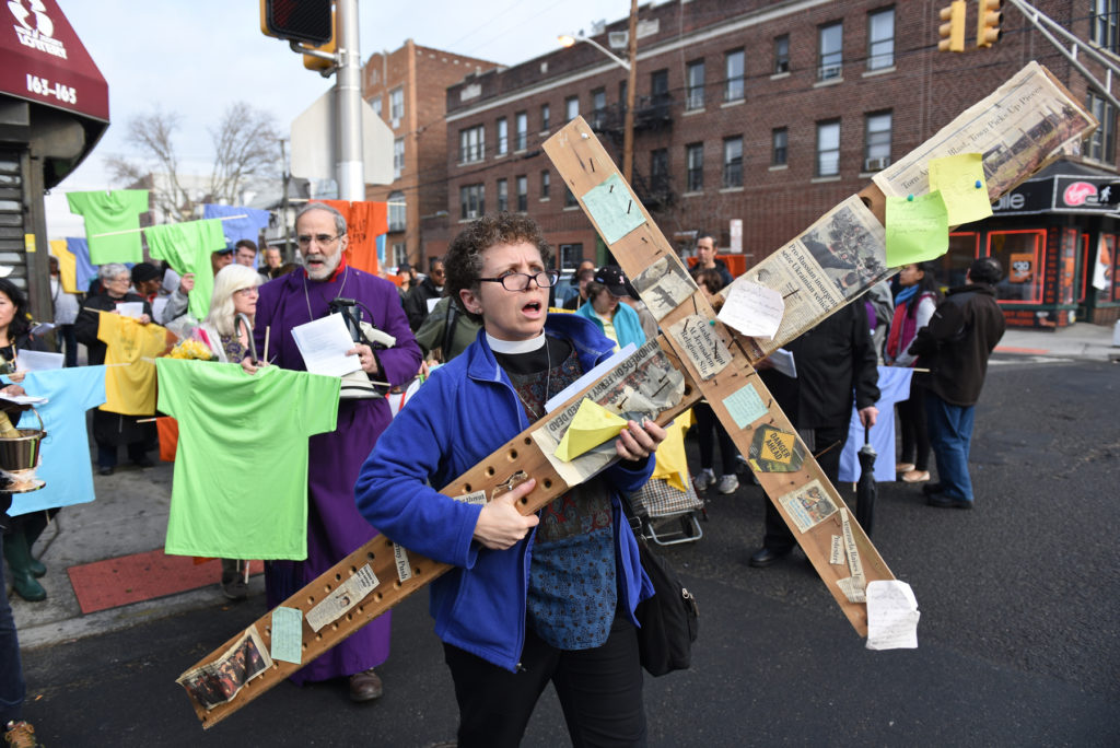 Various congregations, comprising Episcopalians, Lutherans, Methodists, Protestants and Roman Catholics hold the 'Walk With Jesus' Stations of the Cross procession, visiting 14 sites of violent incidents in Jersey City over the last year, on Good Friday, March 25, 2016. Reena Rose Sibayan | The Jersey Journal
