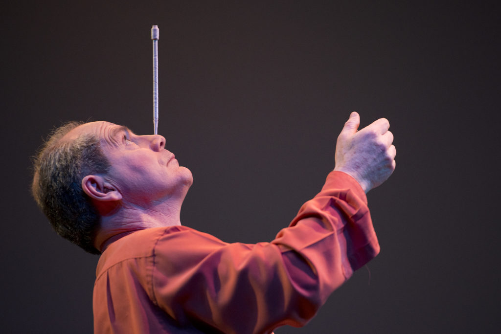 World-renowned juggler Michael Moschen gives a lecture and demonstration during the Presidential Speaker Series at New Jersey City University (NJCU) in Jersey City on Tuesday, March 29, 2016. Here, Moschen balances a pen on his nose. Reena Rose Sibayan | The Jersey Journal