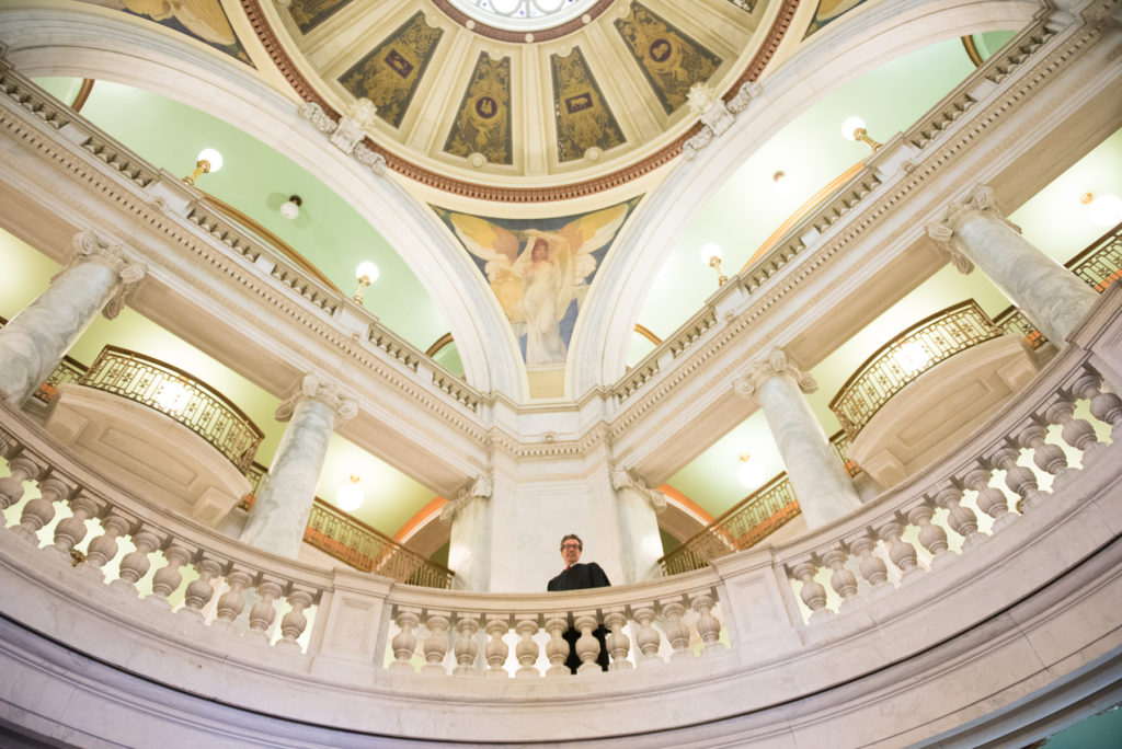 Assignment Judge Peter F. Bariso Jr. looks down from the second floor of the courthouse as he waits for the ceremony to begin. The Hudson Vicinage hosts the annual Law Day awards ceremony on Monday, May 2, 2016, in the rotunda of the Justice William J. Brennan Jr. Courthouse in Jersey City. This yearÕs event, hosted in collaboration with the New Jersey State Bar Association, highlights the 50th anniversary of the landmark U.S. Supreme Court decision in Miranda v. Arizona, which requires law enforcement to advise criminal suspects of their rights before beginning an interrogation. Reena Rose Sibayan | The Jersey Journal