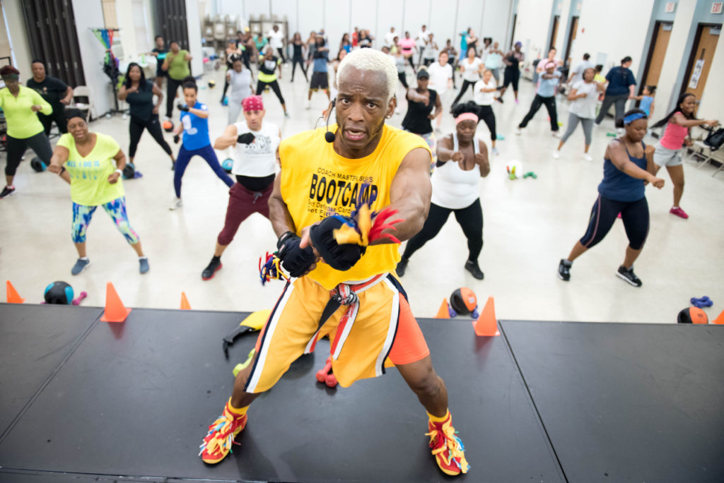 Men and women participate in Master Sup's Cardio Fitness Boot Camp at the Mary McLeod Bethune Center in Jersey City on Thursday, July 7, 2016. Reena Rose Sibayan | The Jersey Journal