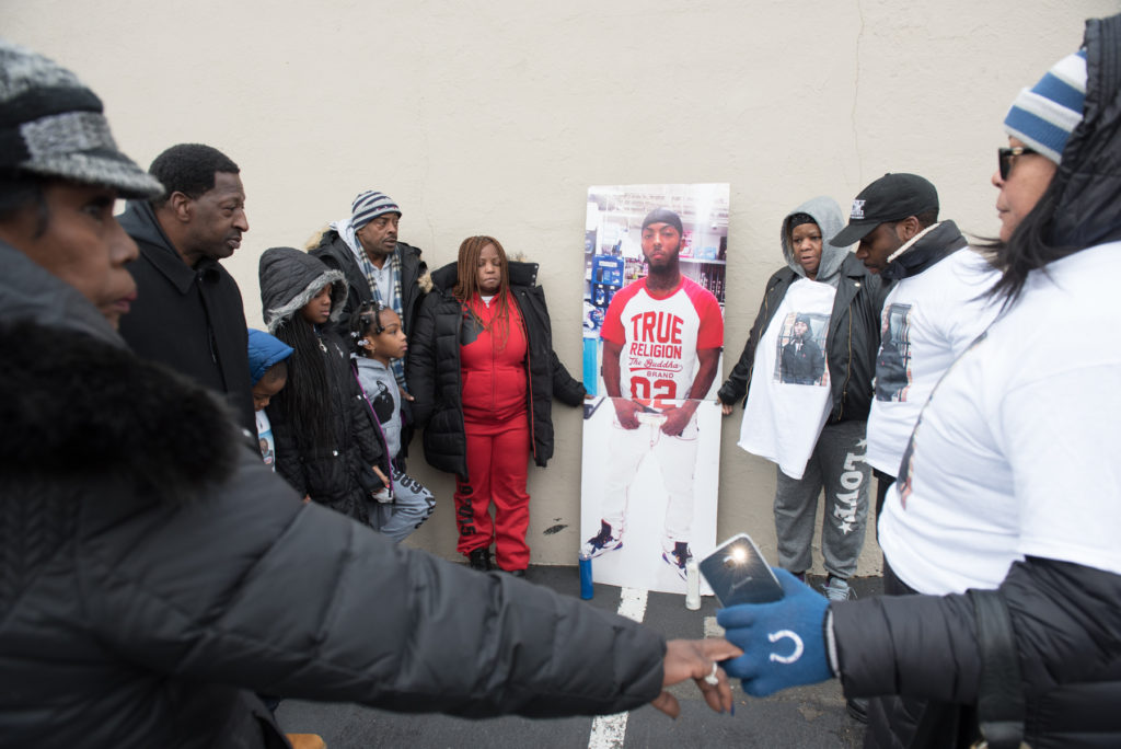Tyreek McCord's family, along with his three young children and led by his mother, Annie (in red), marked the anniversary of his death on Monday, Nov. 21, 2016, by walking from his home on Yale Avenue to the IHOP Restaurant on Route 440 in Jersey City where he was fatally shot in the parking lot. They lit candles, prayed and released balloons in his memory and also voiced their dismay and frustration that a year later, no murder charges have been filed against the suspects arrested in the case. Reena Rose Sibayan | The Jersey Journal